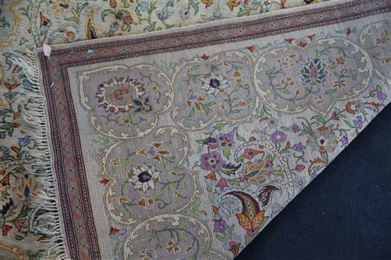 A Persian silk rug, 6ft 8in by 4ft 2in.